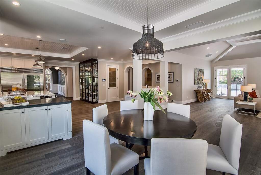 Outdoor living room with fireplace and evening light